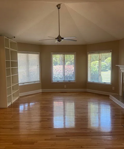 Vaulted ceiling in Living Room with lots of windows for natural light