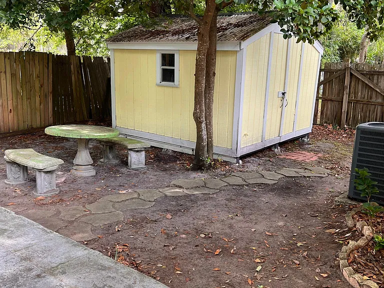 large storage shed in backyard