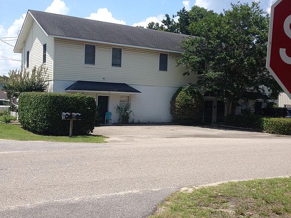 Garage entrance is in the back.