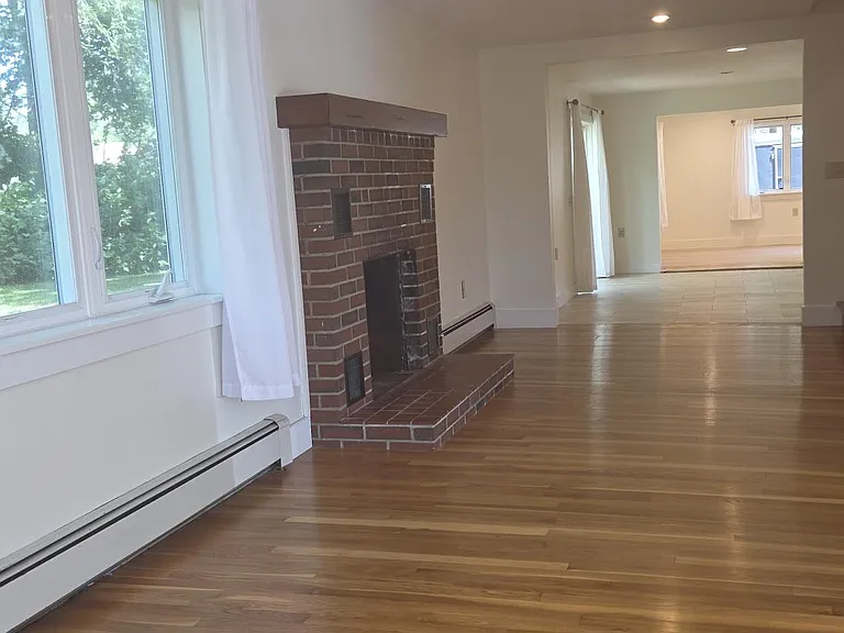 Dining Room View Leading Into Living Room Area