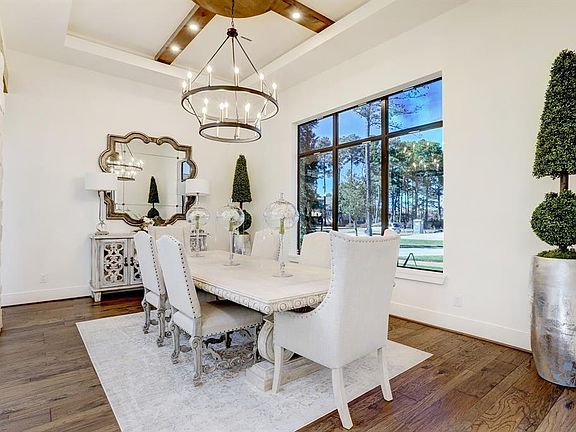Formal dining area to the right of the entry with open views.