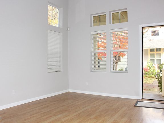 Bright neutral color throughout the house. This front door overlooks the trees and private cul-de-sac of six houses.