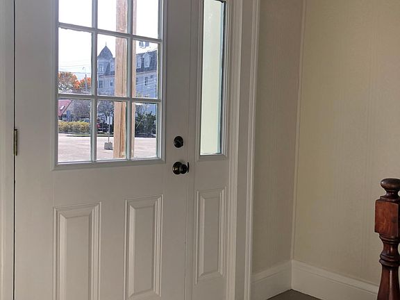 Entry Hall for both apartments Each has it's own front and back doors.