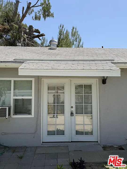 Building Photo - 7418 Amigo Ave #1/2