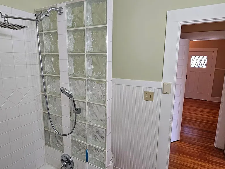 Rainfall shower head is a luxurious addition to this bathroom!