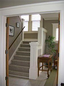 Front stairs lead up to three bedrooms and a bathroom on the renovated second floor.