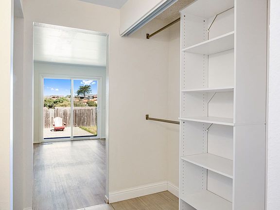 The walkthrough closet has plenty of space for two