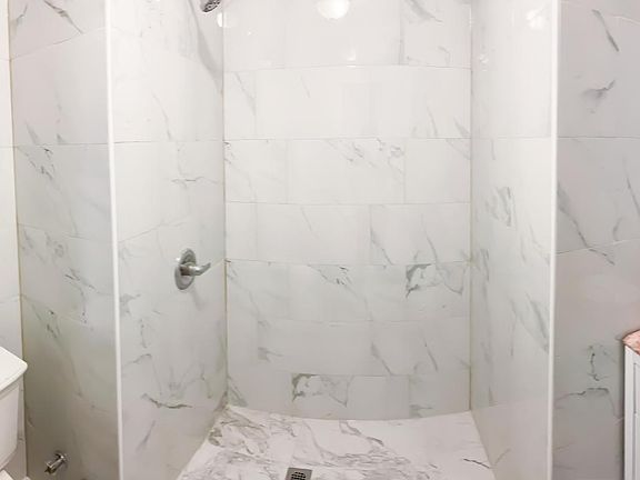 Recently Renovated Bathroom with White Marble!!!