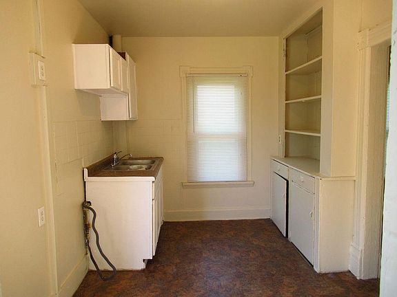 Apt 2 Kitchen: new flooring, cabinets, counter
