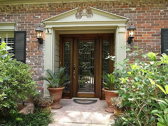Gorgeous beveled glass door with sidelights