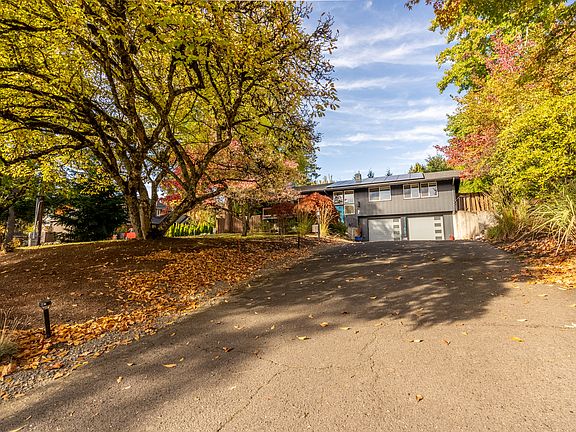 Setback from the street - long driveway for ample parking.