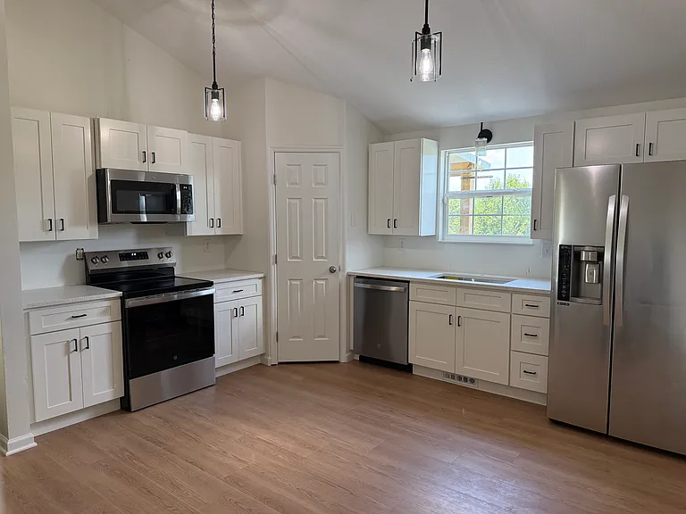 Kitchen: New Cabinets and Counter tops.