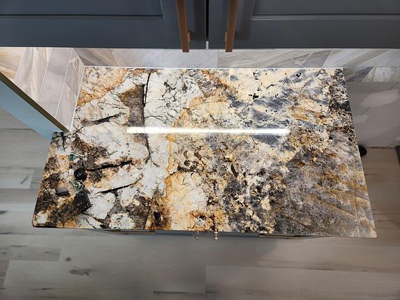 As I said, these are surely the most extravagant granite countertops you've ever seen! These exotic countertops were sourced from a quarry in Brazil. After I saw these countertops, adding under-cabinet lighting to maximize their beauty was a must!