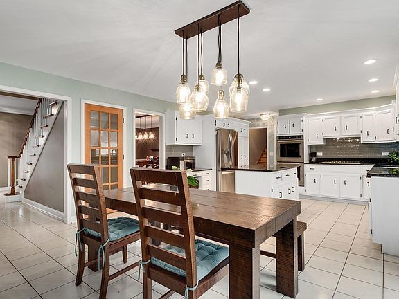 Generous Sized Breakfast Room with Updated Fixture.  Very Open Floor Plan.