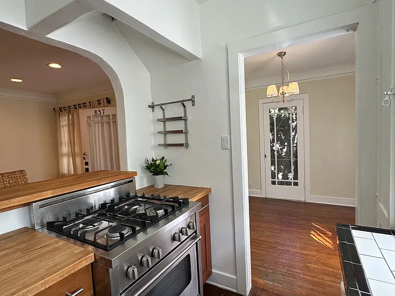 kitchen leads to dining room