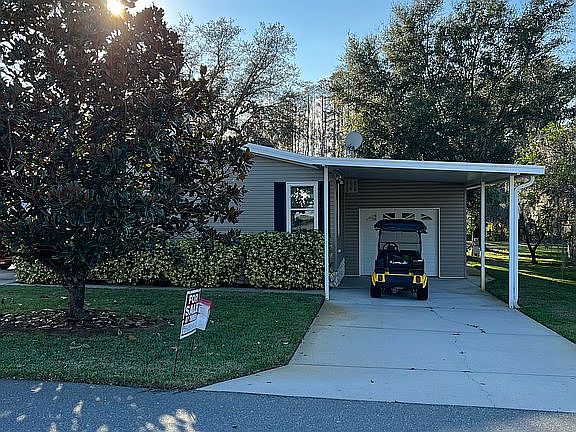 2nd carport golf cart garage