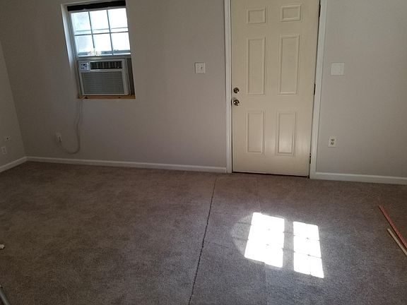 Living room , new carpet throughout.