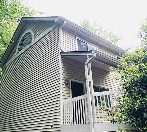 Looking up at front door and porch