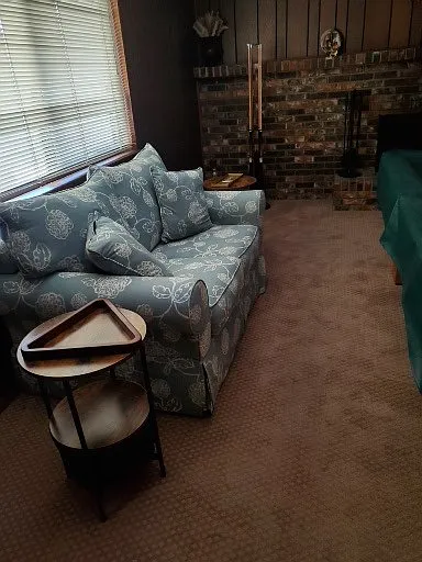 love couch, window blinds, end tables, cue sticks, rack