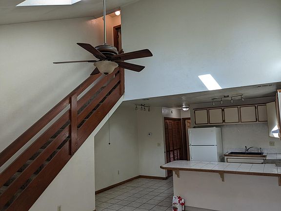 Kitchen and stairs to upstairs bedroom