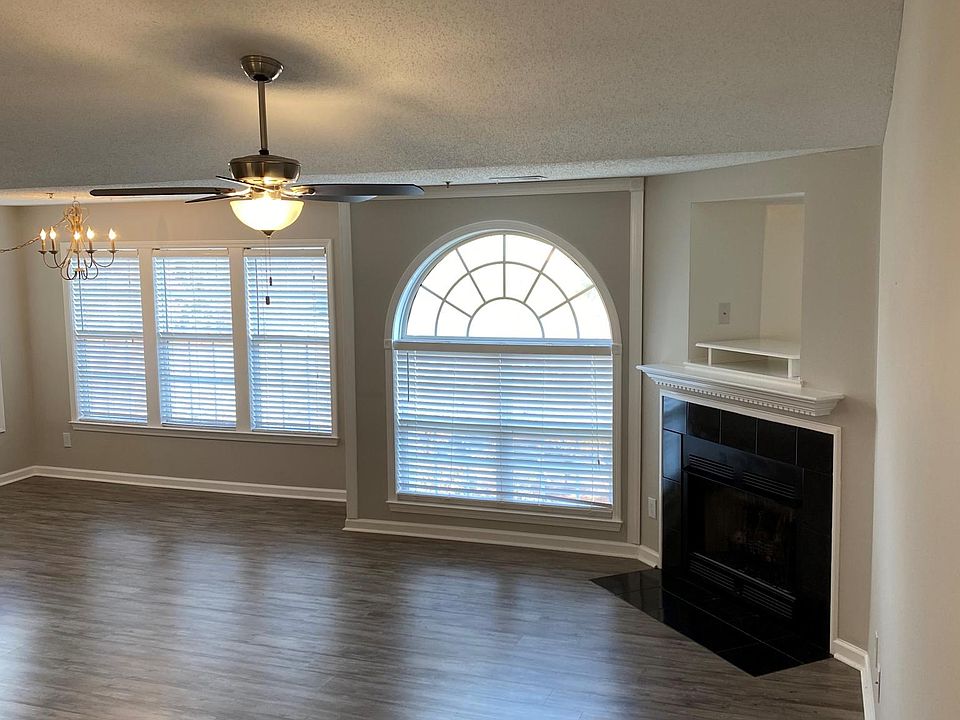 Great room with vaulted ceilings and gas fireplace.
