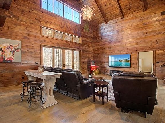 Family room is 27x24 with speakers throughout.  Entire first and second floor has 1/2" rubber and traditional insulation, with f