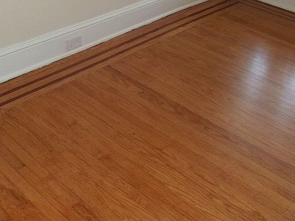 Inlay border detail of original wood floors