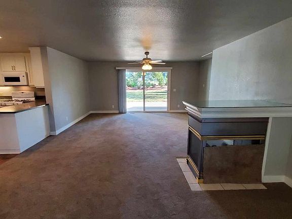 LIVING ROOM FIRE PLACE KITCHEN