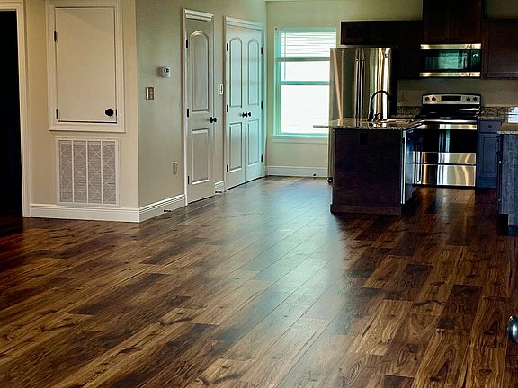 View from the front door. Hard wood floors throughout and lots of room. This 1 bedroom and 1 full bathroom is 1,040 square feet. This unit has a walk in shower. This is a must see!