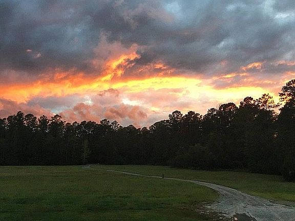 Front yard and drive, sunset