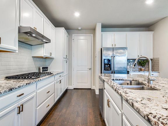 Lots of counter space in kitchen with gas stove.