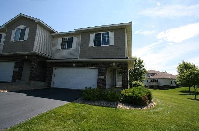 Hard to find END UNIT with views of a wide open grassy space! Great Lakeville location close to Life