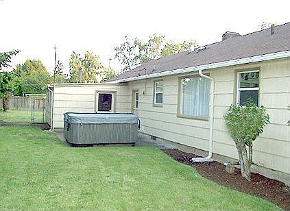 Backyard with Shop and Hot tub 