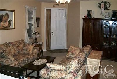 Covered Screened Entry to Foyer & Living Room