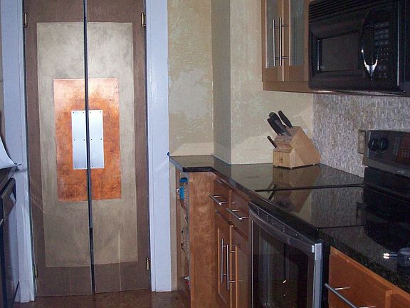 Renovated kitchen, cork floors, custom cabinets, new appliances