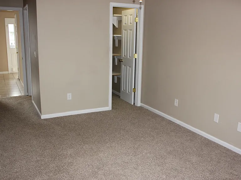 First-floor master bedroom with walk-in closet