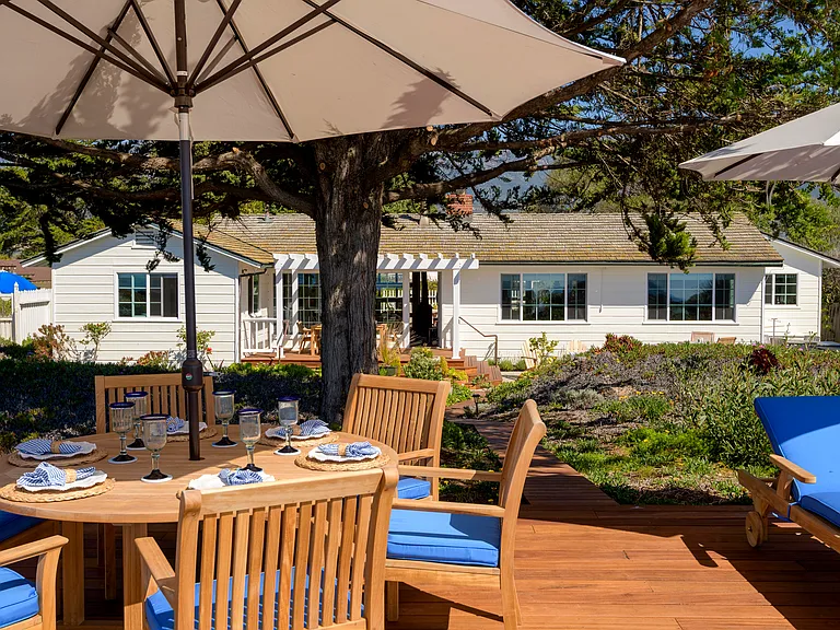 View of back of house from beach deck. All new deck and walkway to house!