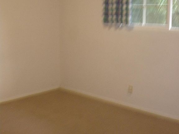 Another bedroom, carpeted, closet