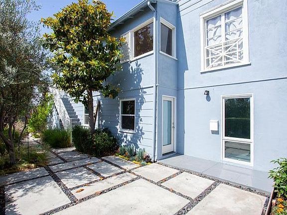 Front door with large private outdoor patio.