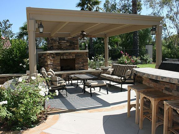 Backyard Seating area with Stone Fireplace