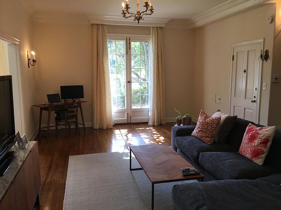 Living Room facing the front garden & street view. Directly 