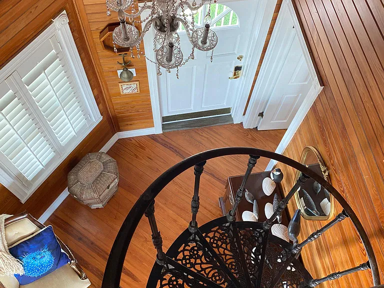Spiral staircase leading up to the second floor