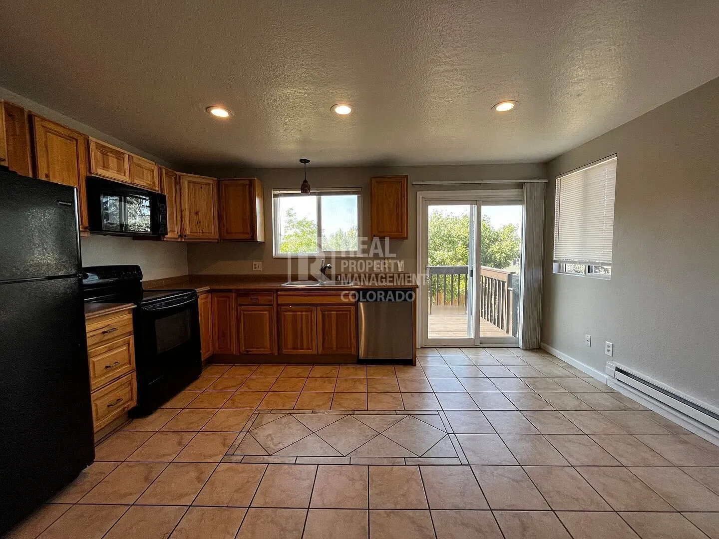 4-Bedroom Corner-Lot Home with Finished Basement — Photo 4