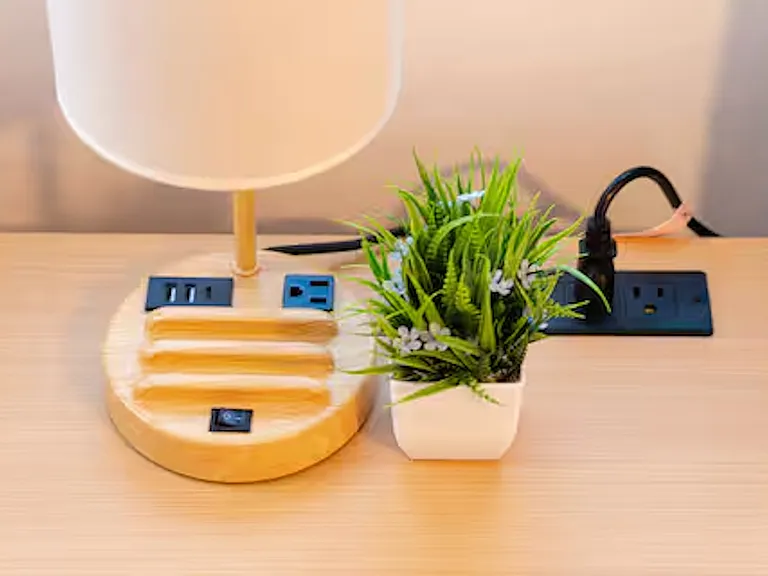 Bedroom 2 is bright and airy with windows and blackout blinds, featuring a king bed, ceiling fan, and a lampshade with extra outlet and USB ports for easy device charging. Ample closet space completes this comfortable and convenient retreat.