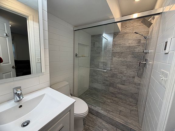 updated bathroom. HEATED FLOOR (tenant controls the temperature)