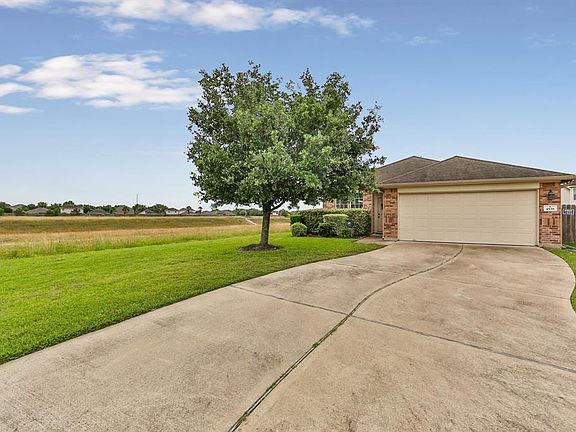 The long double wide driveway provides for extra parking when entertaining family and friends! Located at the end of a quiet cul-de-sac street with no neighbors to the left of the home and there is easy access to the walking trails.