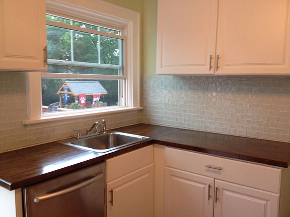 New kitchen cabinets, tile backsplash, counter