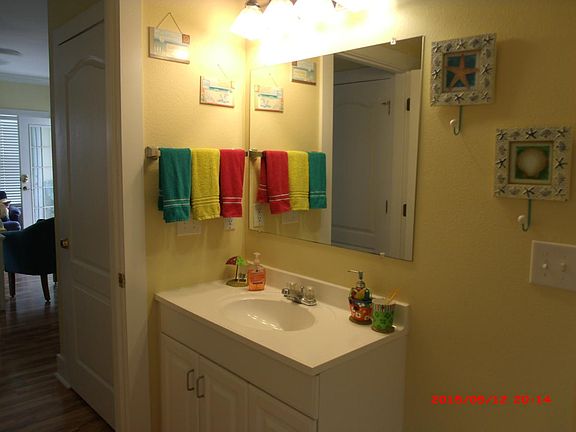 shelving with towels behind door