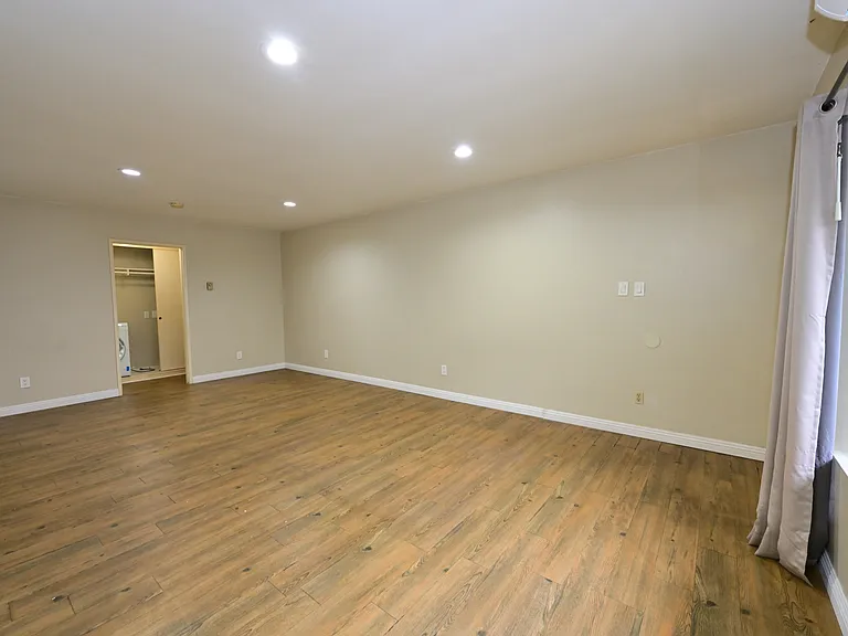 Fully Updated unit with In-unit Laundry, built-in cabinet, SS kitchen appliance + quartz countertop