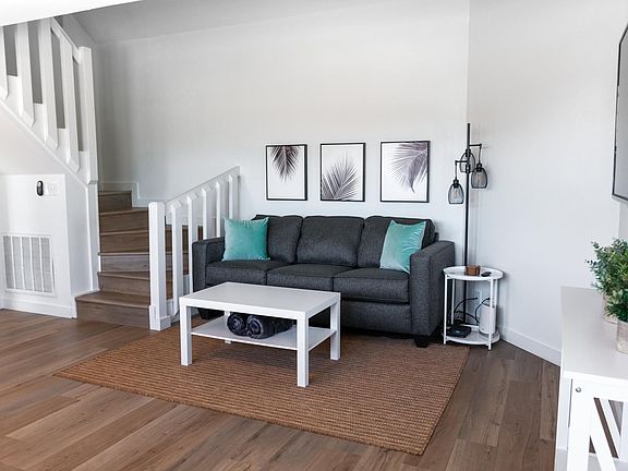 Enjoy the cozy living room with Roku TV including Hulu, Disney+ & ESPN+
